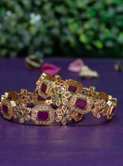 Antique floral design bangle with kemp and cz stones