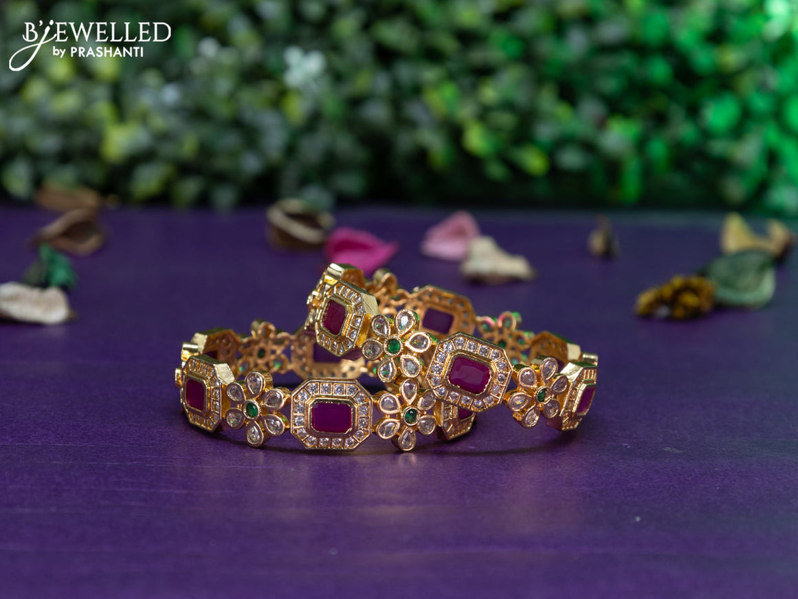 Antique floral design bangle with kemp and cz stones