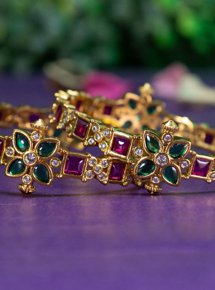 Antique floral design bangle with kemp and cz stones