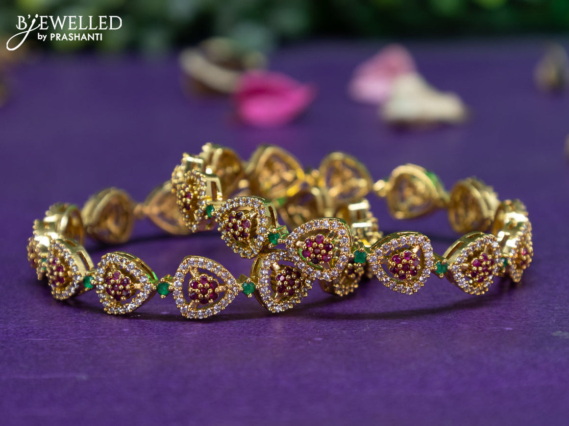 Antique floral design bangle with kemp and cz stones