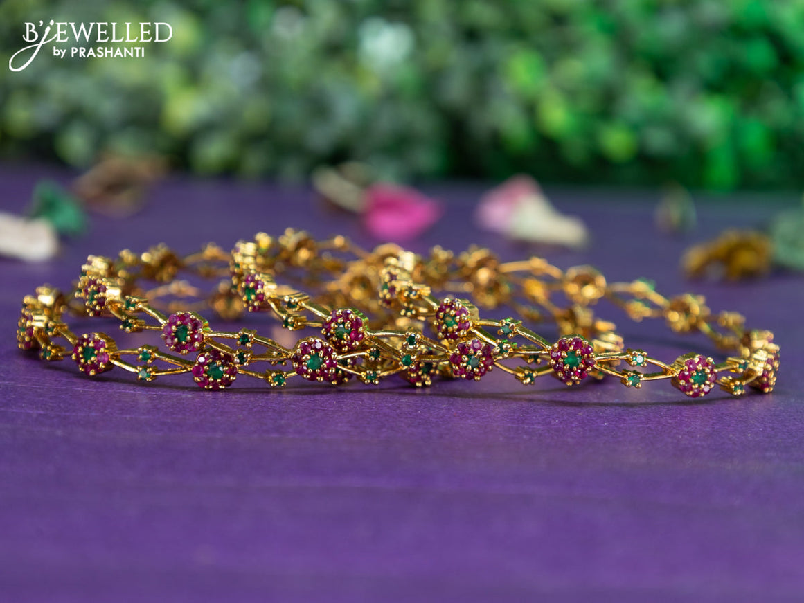 Antique floral design bangle with kemp stones