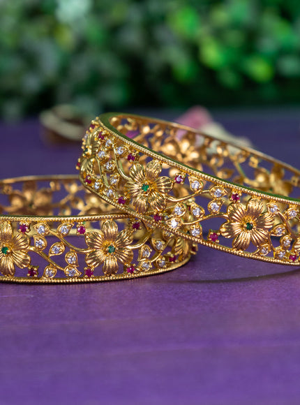 Antique floral design bangle with kemp and cz stones