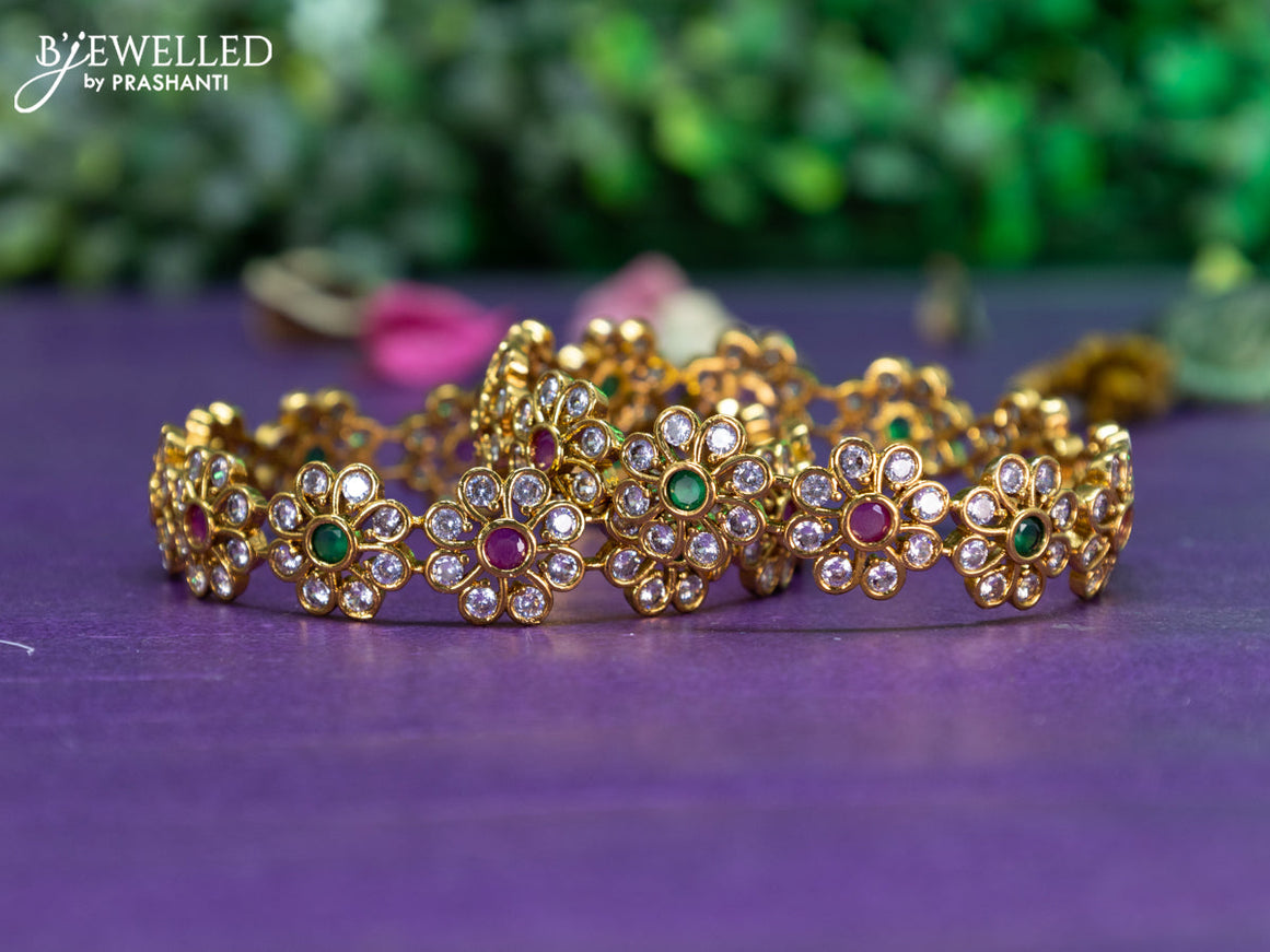 Antique floral design bangle with kemp and cz stones