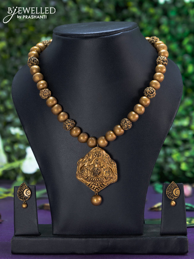 Terracotta rudhraksha necklace with lakshmi pendant and hanging