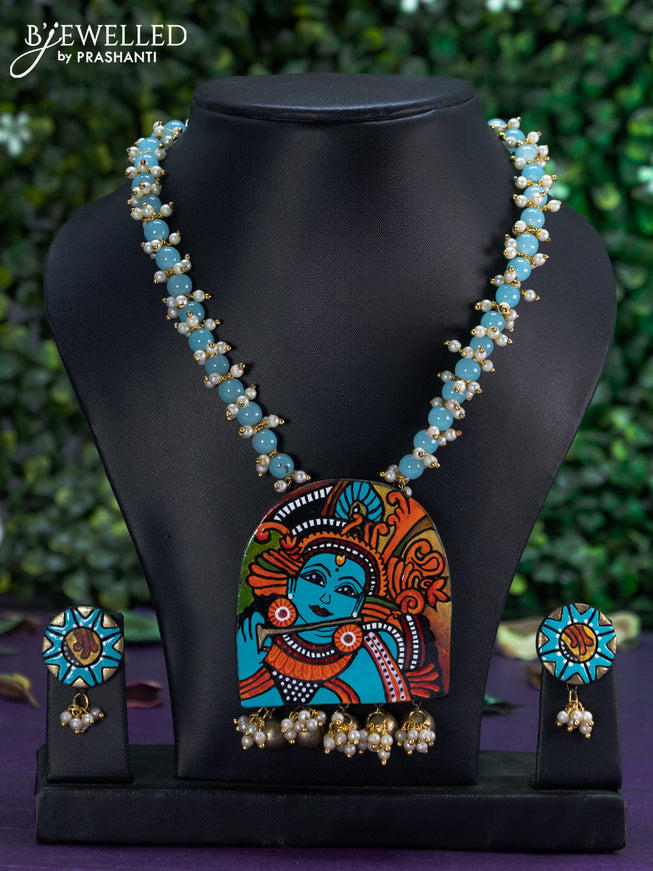 Terracotta pearl & beaded necklace with krishna pendant and hangings