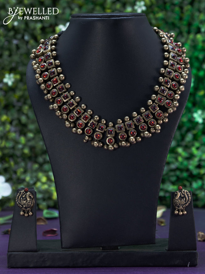 Terracotta necklace with ruby stones and hangings