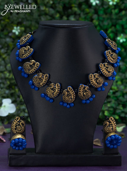 Terracotta blue necklace with peacock design