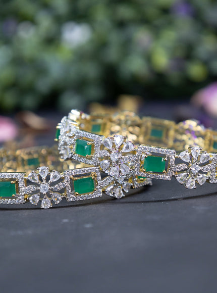 Zircon bangles floral design with emerald and cz stones in gold finish