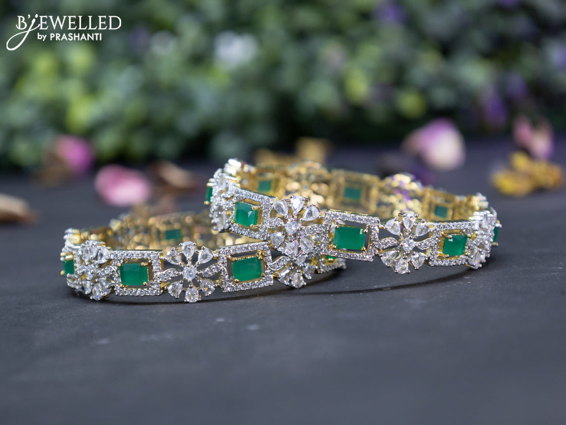 Zircon bangles floral design with emerald and cz stones in gold finish