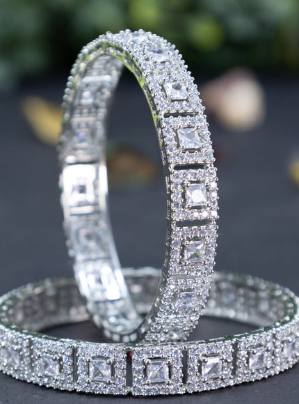 Zircon bangles with cz stones