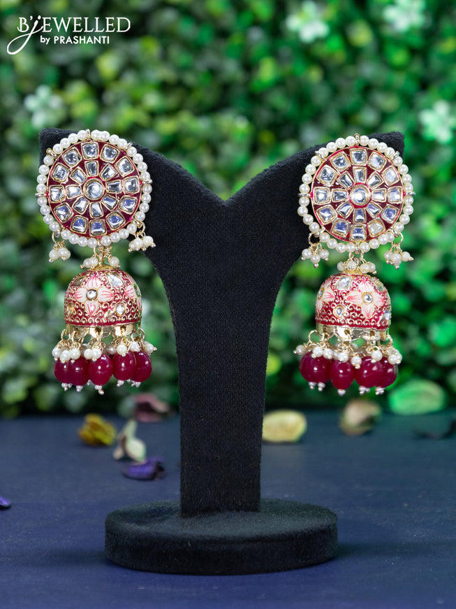 Fashion dangler pink minakari jhumkas with kundan stones and beads hanging