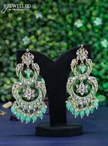 Fashion dangler chandbali teal green minakari earrings with kundan stones and beads hanging