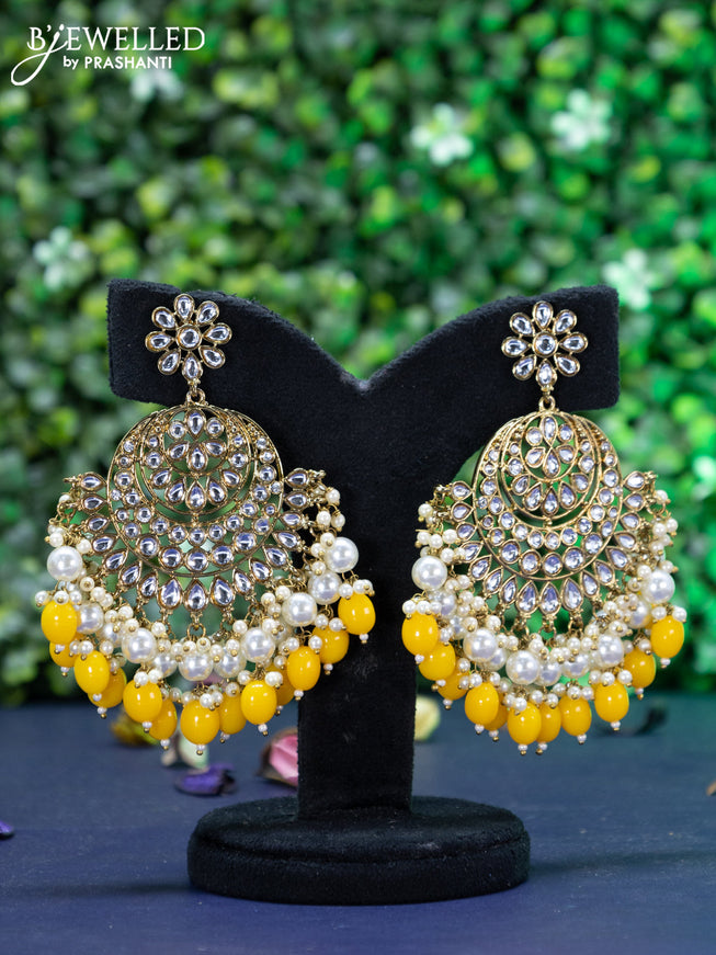 Fashion dangler earrings yellow beads and kundan stones