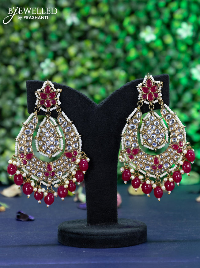 Fashion dangler pink earrings with kundan stones and beads hangings