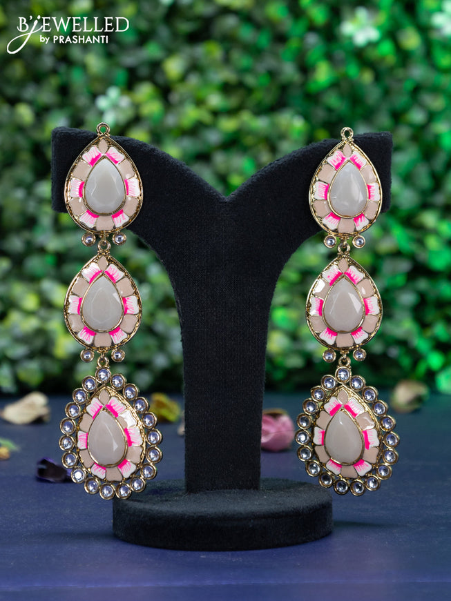 Fashion dangler minakari earrings with peach shade and kundan stones