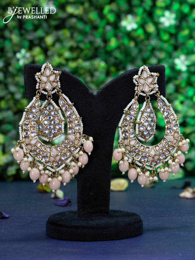 Fashion dangler peach shade earrings with kundan stones and beads hangings