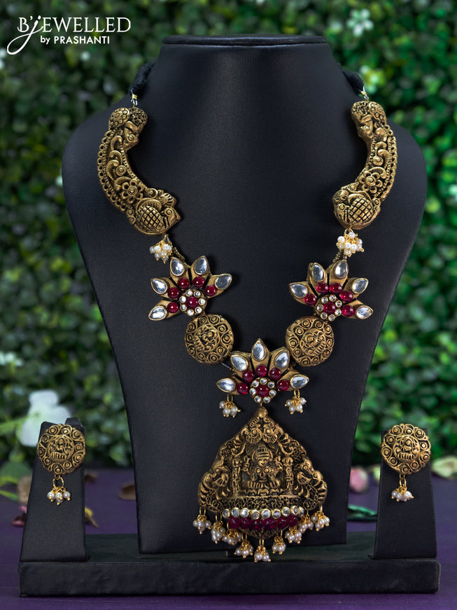 Terracotta necklace ruby & cz stones with lakshmi pendant and pearl hangings