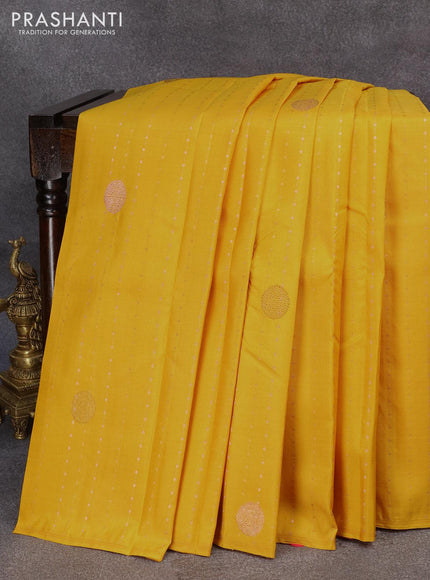 Pure kanjivaram silk saree yellow and pink with allover zari weaves & buttas in borderless style