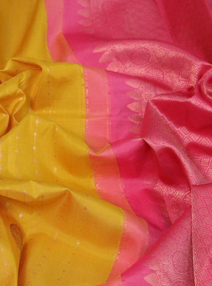 Pure kanjivaram silk saree yellow and pink with allover zari weaves & buttas in borderless style