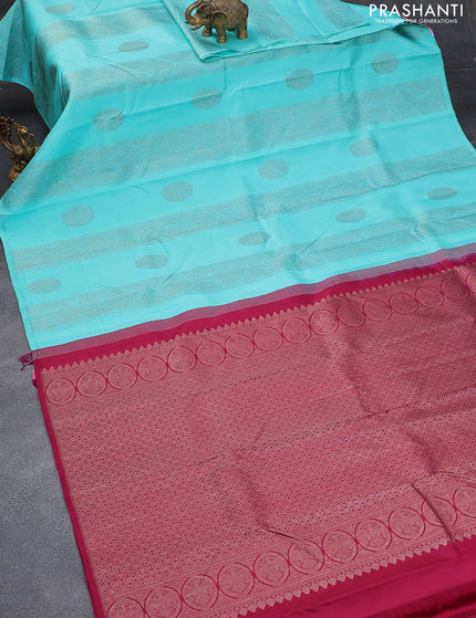 Pure kanjivaram silk saree light blue and dark magenta pink with zari woven buttas in borderless style