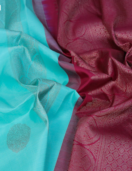 Pure kanjivaram silk saree light blue and dark magenta pink with zari woven buttas in borderless style