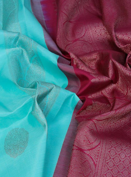 Pure kanjivaram silk saree light blue and dark magenta pink with zari woven buttas in borderless style