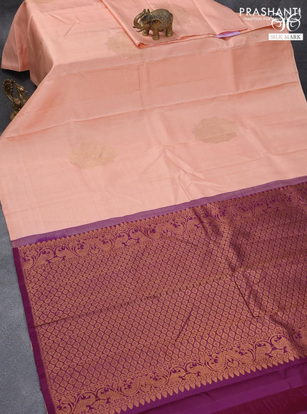 Pure kanjivaram silk saree peach shade and dark magenta pink with zari woven buttas in borderless style