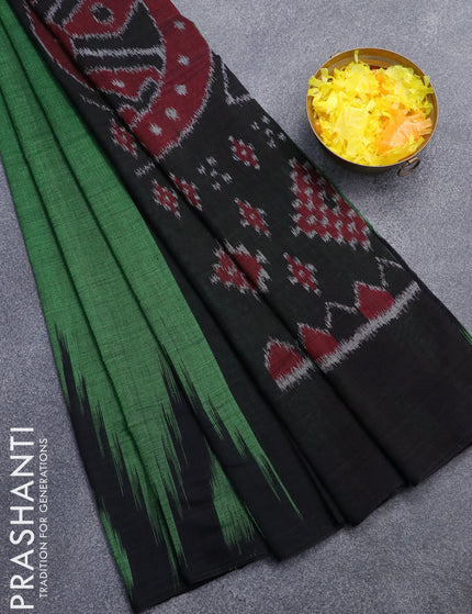 Ikat cotton saree green and black with plain body and temple design ikat woven border without blouse