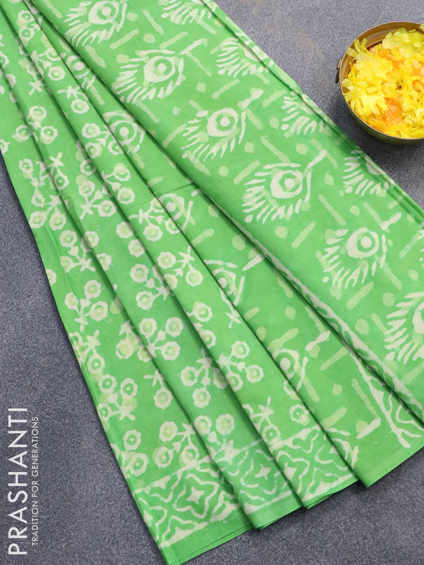 Jaipur cotton saree light green with allover prints and printed border