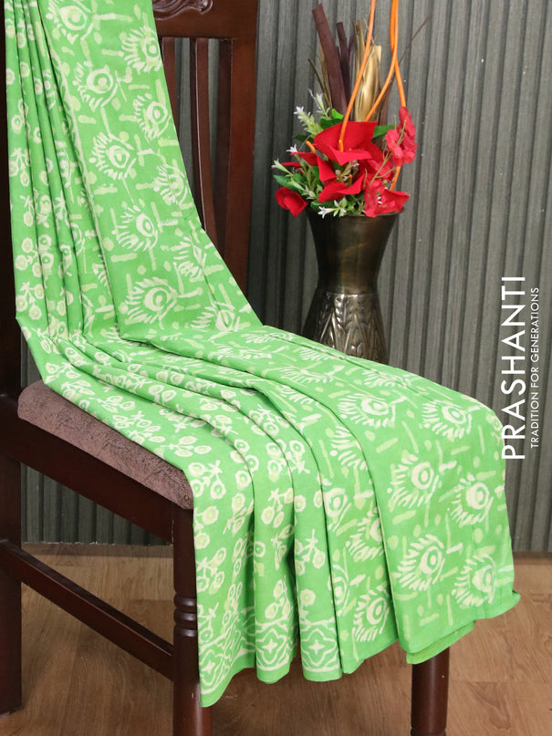 Jaipur cotton saree light green with allover prints and printed border