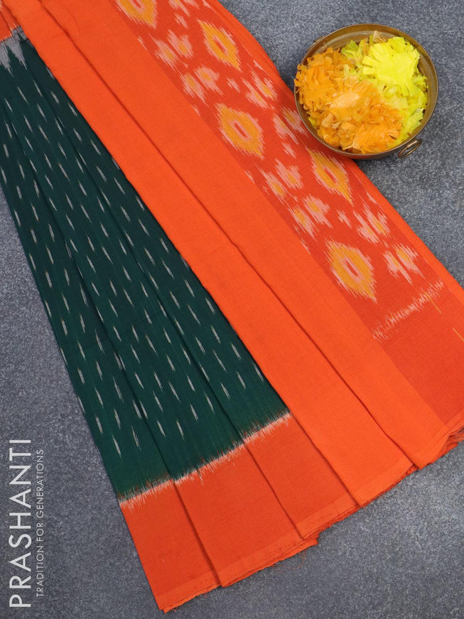 Ikat cotton saree dark green and orange with allover ikat butta weaves and printed border