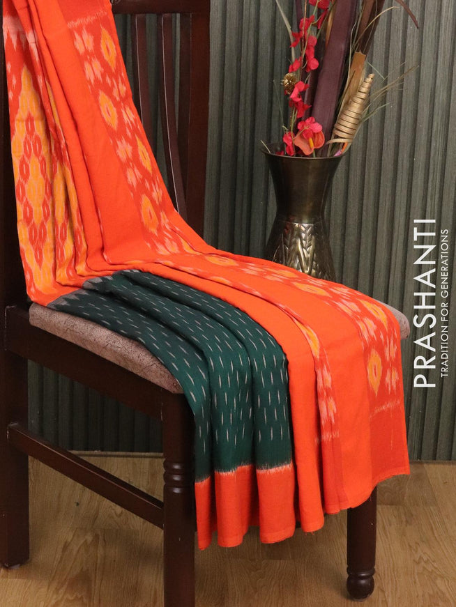 Ikat cotton saree dark green and orange with allover ikat butta weaves and printed border