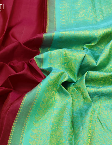 Pure kanjivaram silk saree dark pink and teal green with zari woven geometric buttas in borderless style