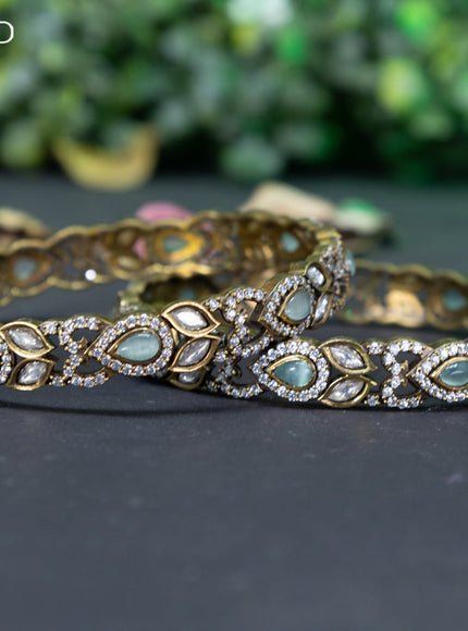 Victorian bangle with mint green and cz stones