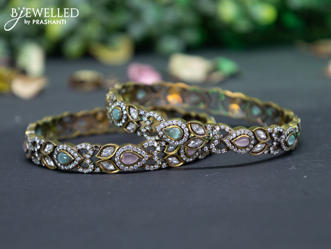 Victorian bangle with mint green & baby pink and cz stones