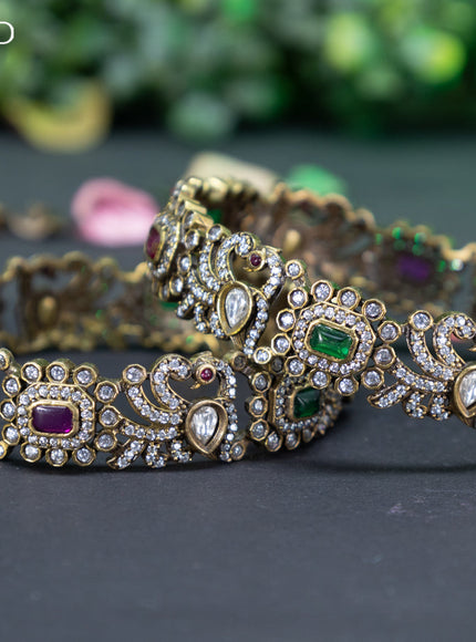 Victorian bangle peacock design with kemp and cz stones