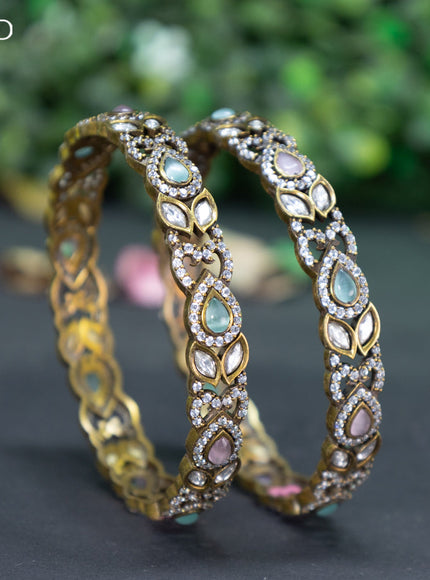 Victorian bangle with mint green & baby pink and cz stones