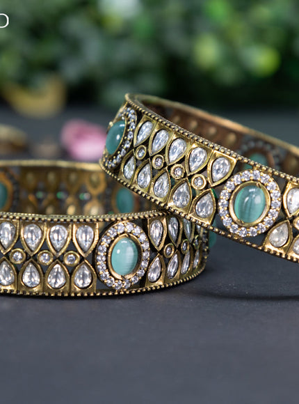 Victorian bangle with mint green and cz stones