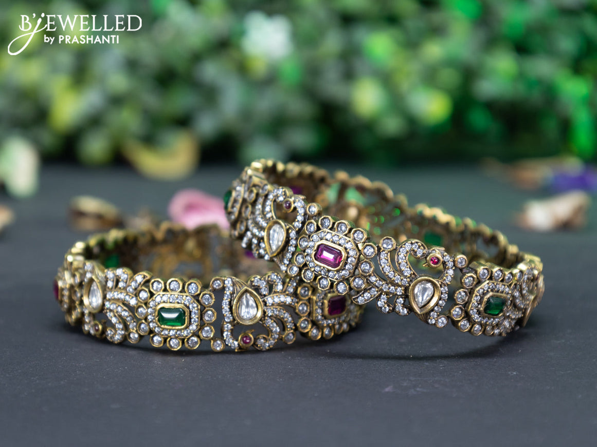 Victorian bangle peacock design with kemp and cz stones