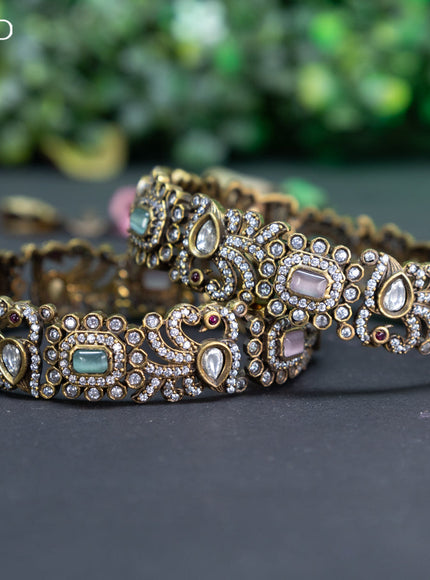 Victorian bangle peacock design with mint green & baby pink and cz stones