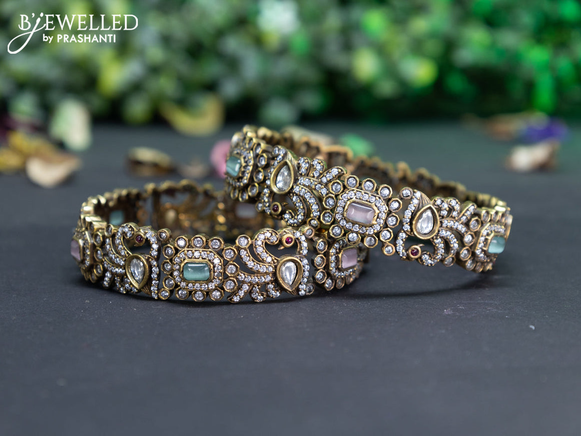 Victorian bangle peacock design with mint green & baby pink and cz stones