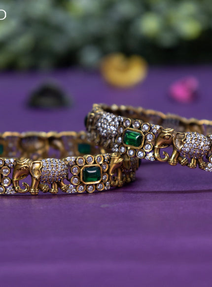 Victorian bangle elephant design with emerald and cz stones