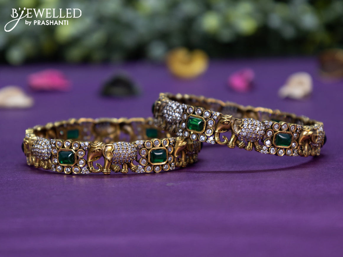 Victorian bangle elephant design with emerald and cz stones