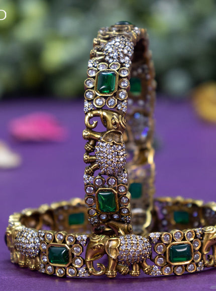 Victorian bangle elephant design with emerald and cz stones