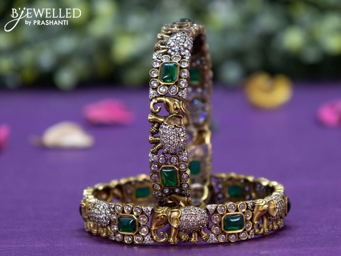 Victorian bangle elephant design with emerald and cz stones