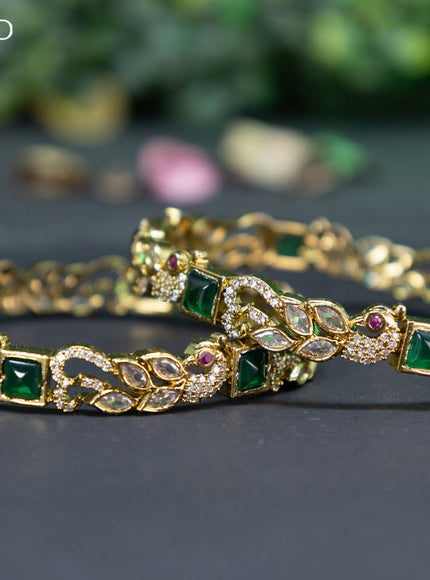 Victorian bangle peacock design with emerald and cz stones