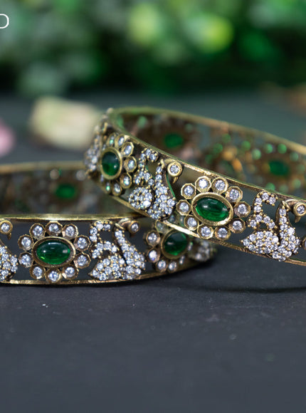 Victorian bangle swan design with emerald and cz stones