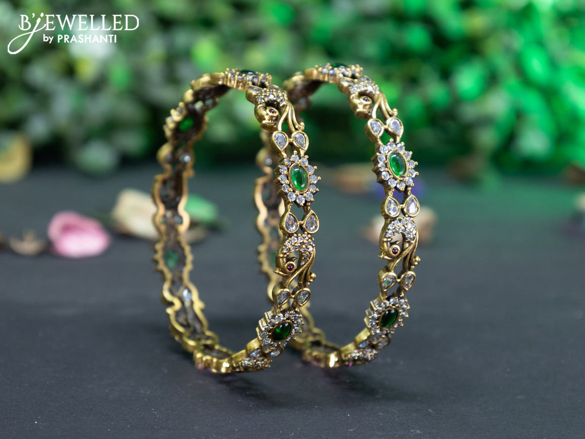 Victorian bangle peacock design with emerald and cz stones