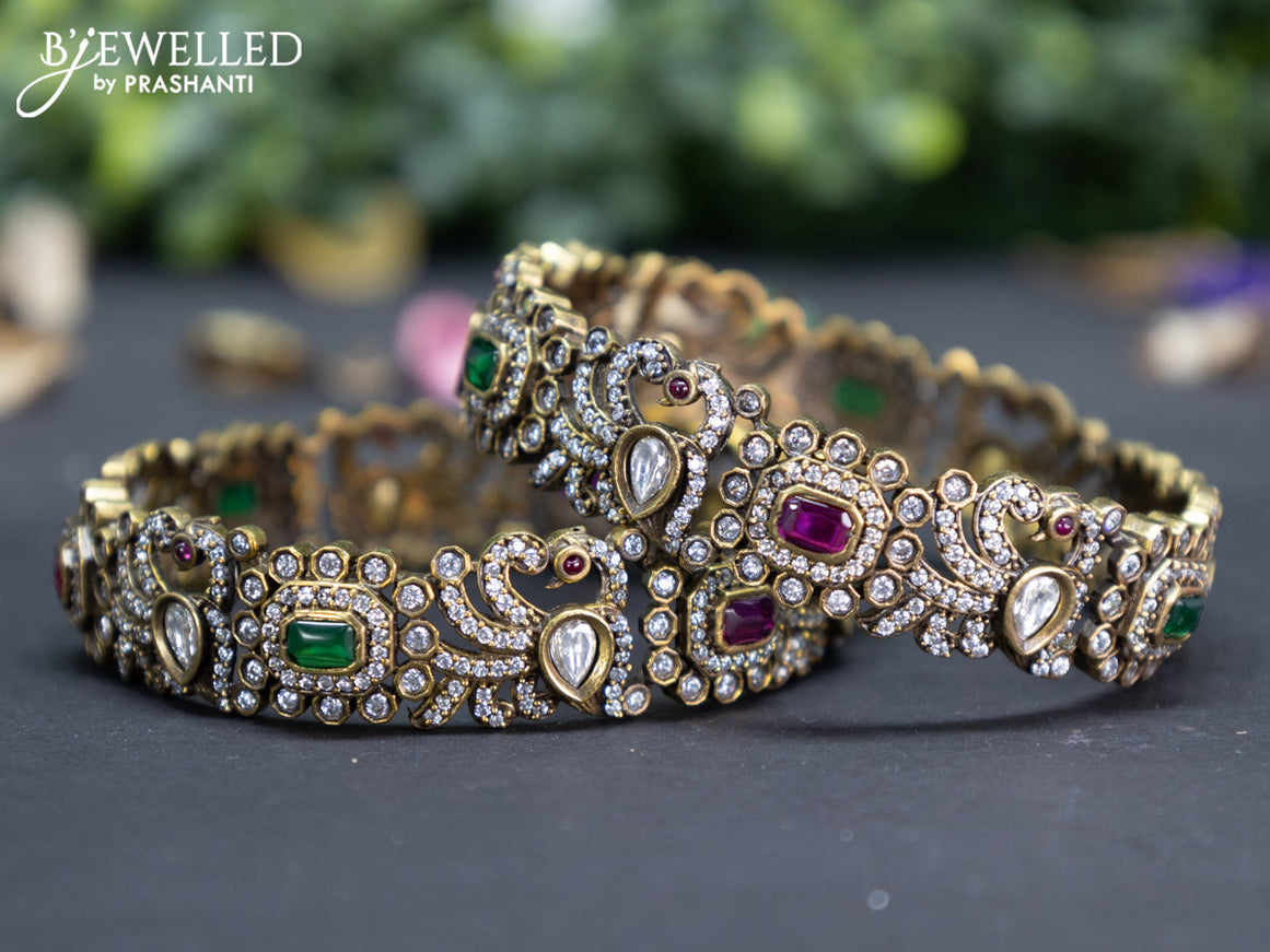 Victorian bangle peacock design with kemp and cz stones