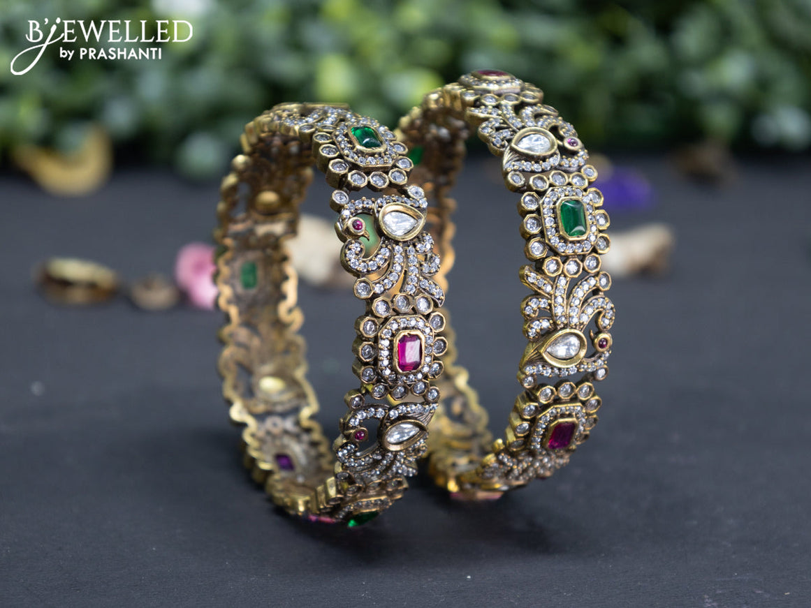 Victorian bangle peacock design with kemp and cz stones